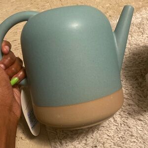 Treshold Watering Can